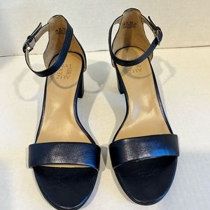 9.5 Wide Naturalized open toe dress sandals.